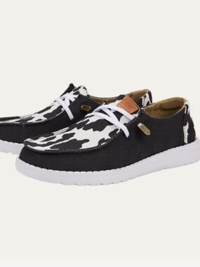 Cow print Hey Dudes Sz 7